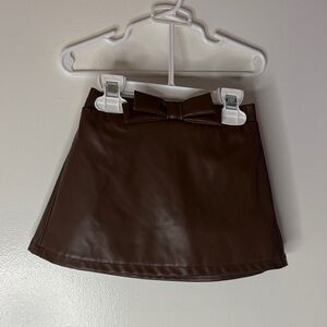 Infant/Kids Brown Faux Leather Skirt with Bow Detail